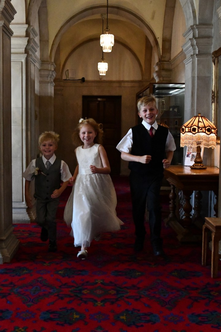 children running down the corridor at the town hall