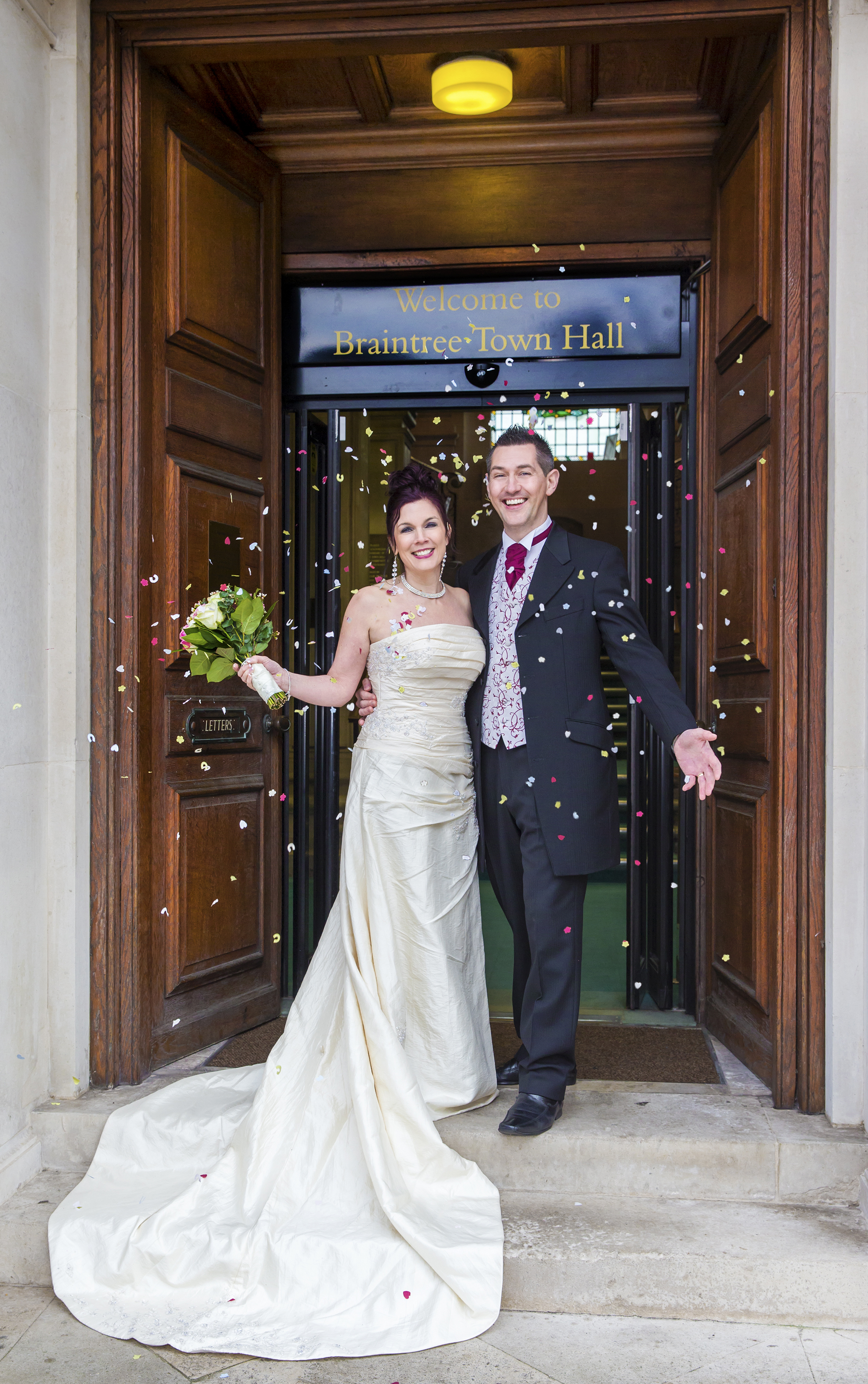 Wedding couple at front doors